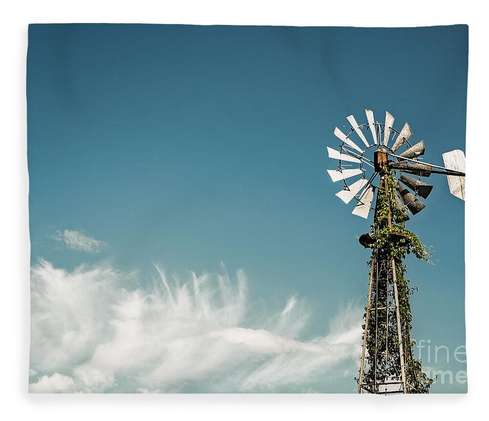 Canada Fleece Blanket featuring the photograph Vines Growing Up a Windmill in Canada by Bryan Mullennix