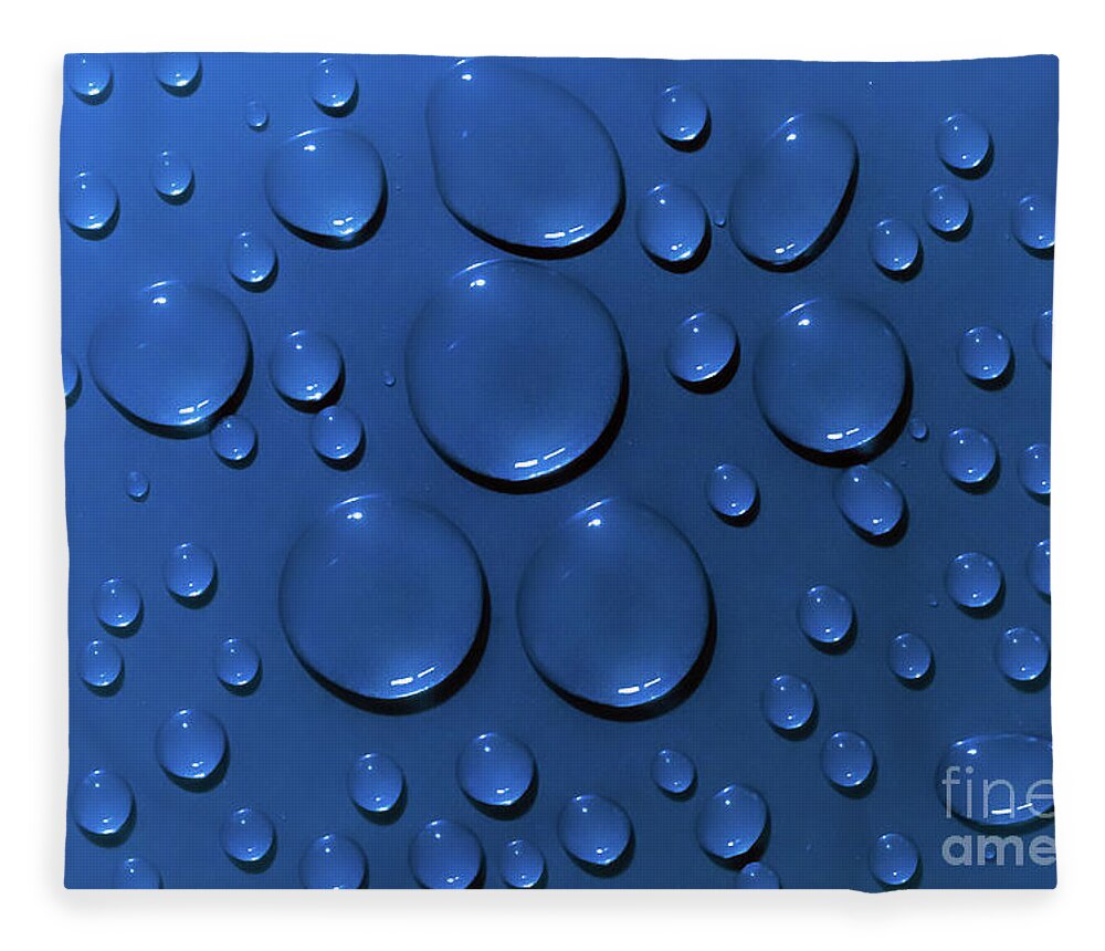 Water Fleece Blanket featuring the photograph Water drops pattern on blue background by Simon Bratt