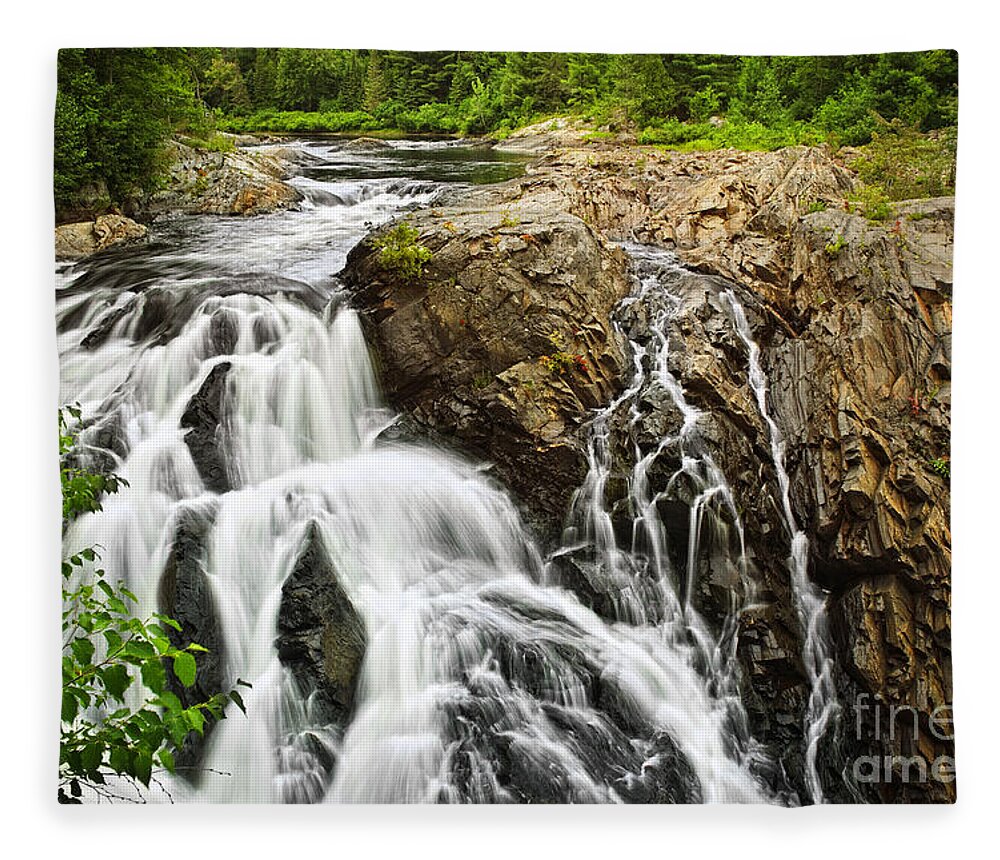 Waterfall Fleece Blanket featuring the photograph Waterfall in wilderness by Elena Elisseeva