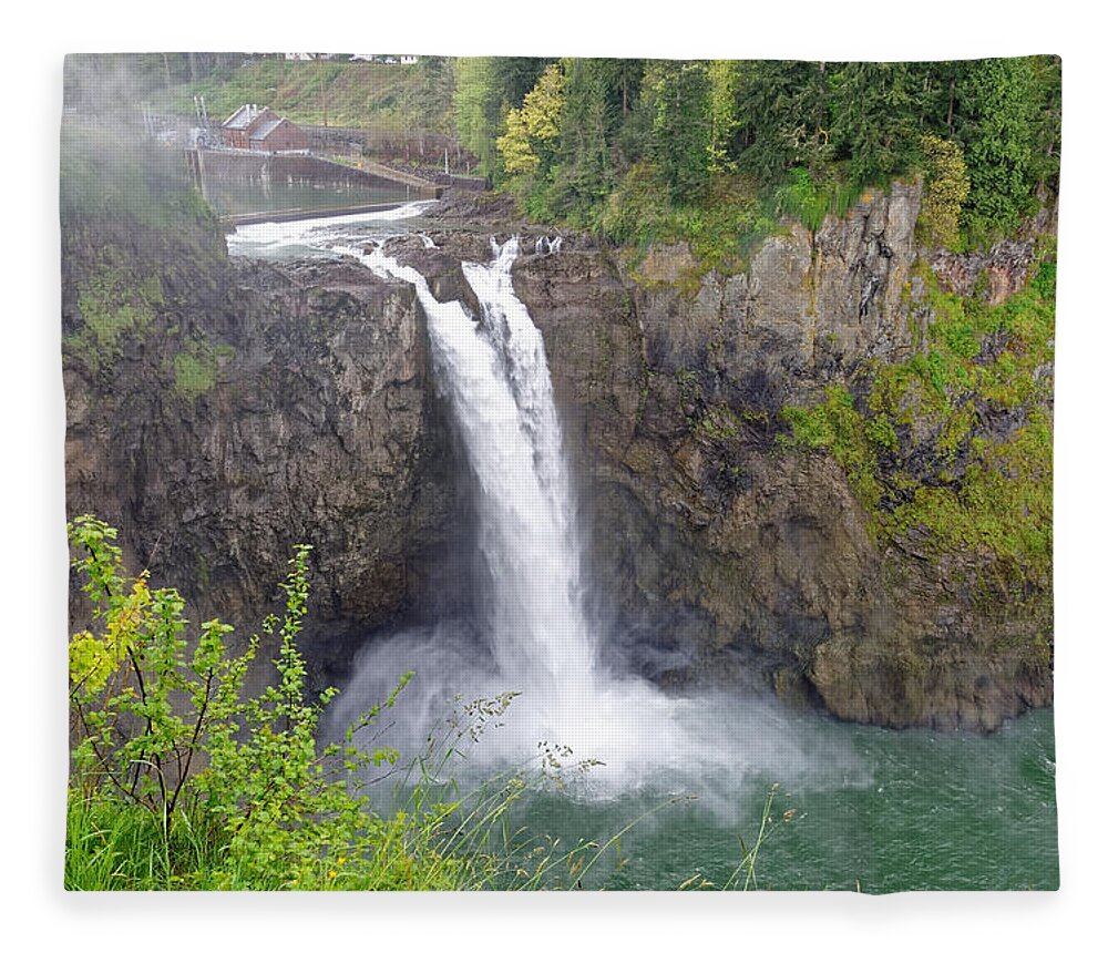 Waterfall Fleece Blanket featuring the photograph Waterfall through the mist by Peter Ponzio