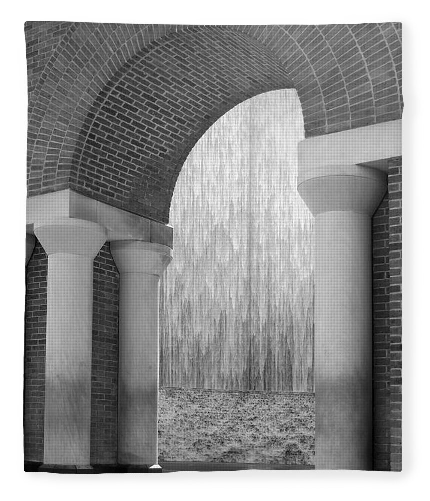 Houstonian Fleece Blanket featuring the photograph Waterwall and Arch 3 in Black and White by Angela Rath