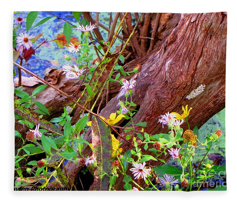 Wildflowers Fleece Blanket featuring the photograph Wildflowers on a Cypress Knee by Barbara Bowen