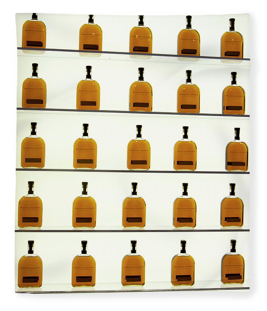 American Fleece Blanket featuring the photograph Woodford Reserve Visitors Center bottle display by Karen Foley