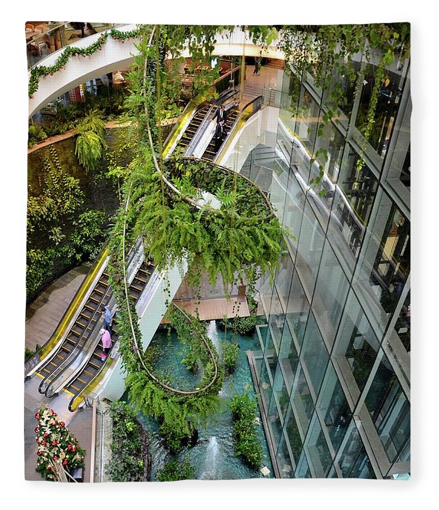Green vertical interior design of Emquartier shopping mall dining