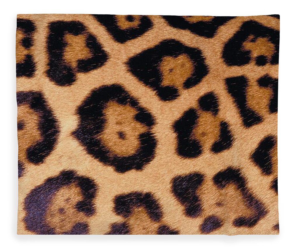 Animal Skin Fleece Blanket featuring the photograph 23899700 by Jupiterimages
