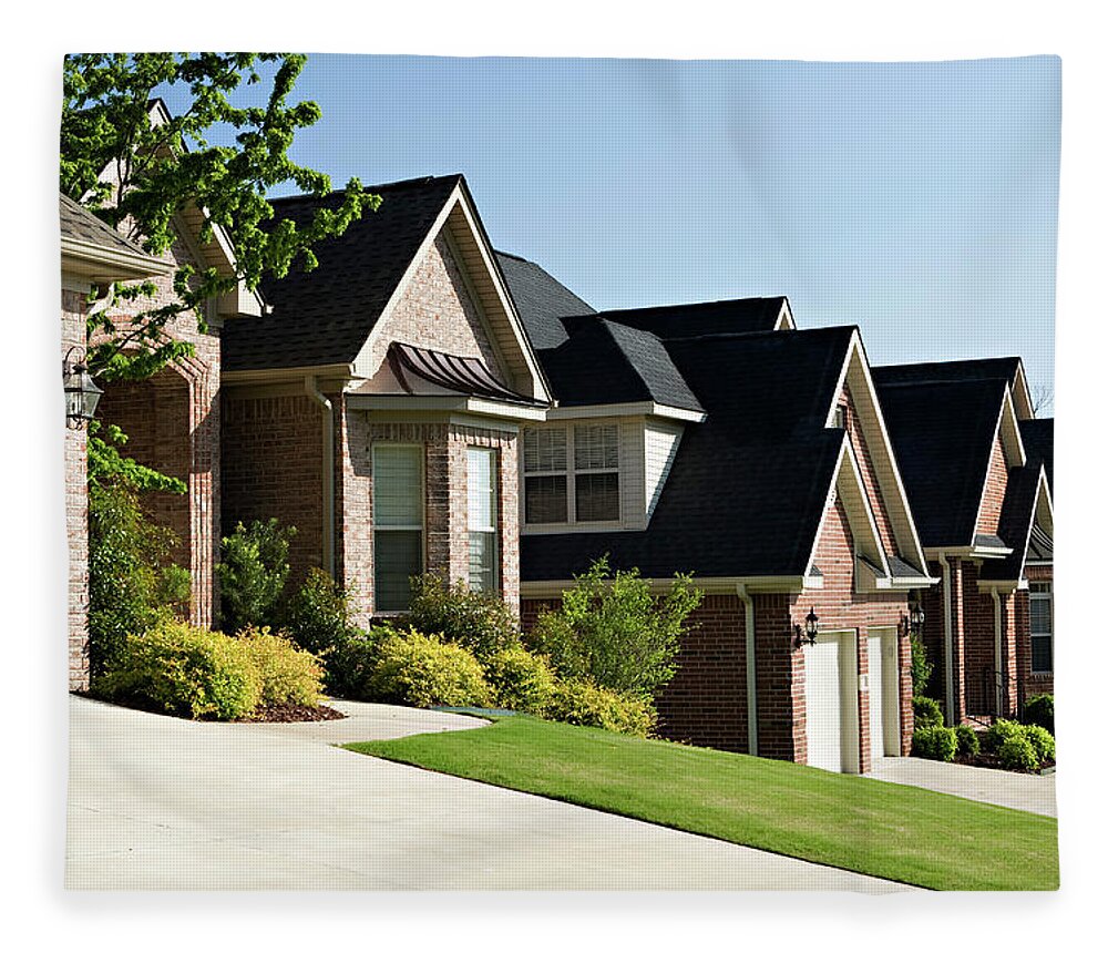 Row House Fleece Blanket featuring the photograph A Row Of Homes In A Residential by Wesley Hitt