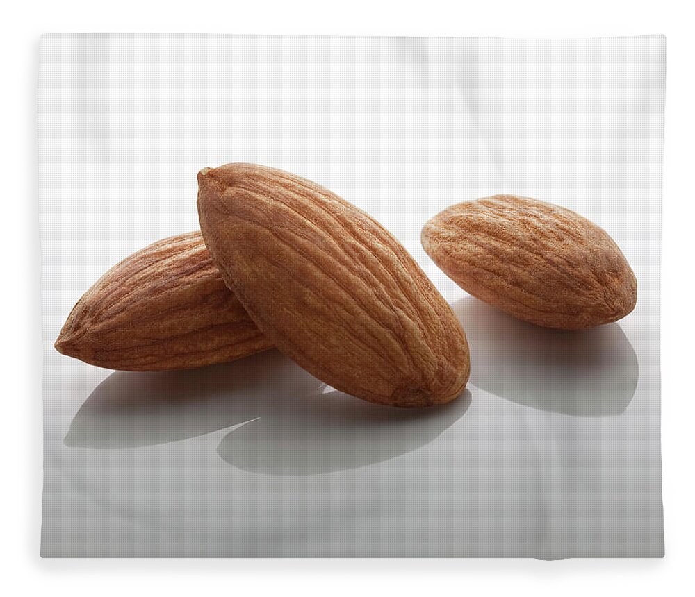 Nut Fleece Blanket featuring the photograph Almond Nuts by Burazin