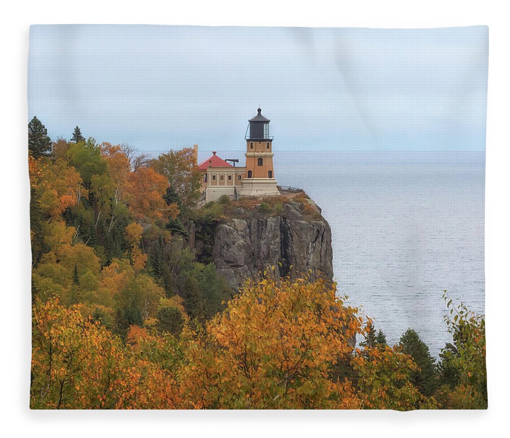 Lighthouse Fleece Blanket featuring the photograph Autumn at Split Rock Lighthouse by Susan Rissi Tregoning