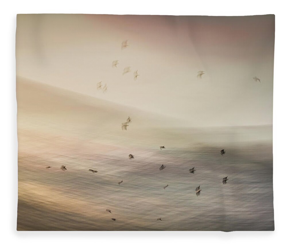Intentional Camera Movement Fleece Blanket featuring the photograph Birds over the Sea by Anita Nicholson