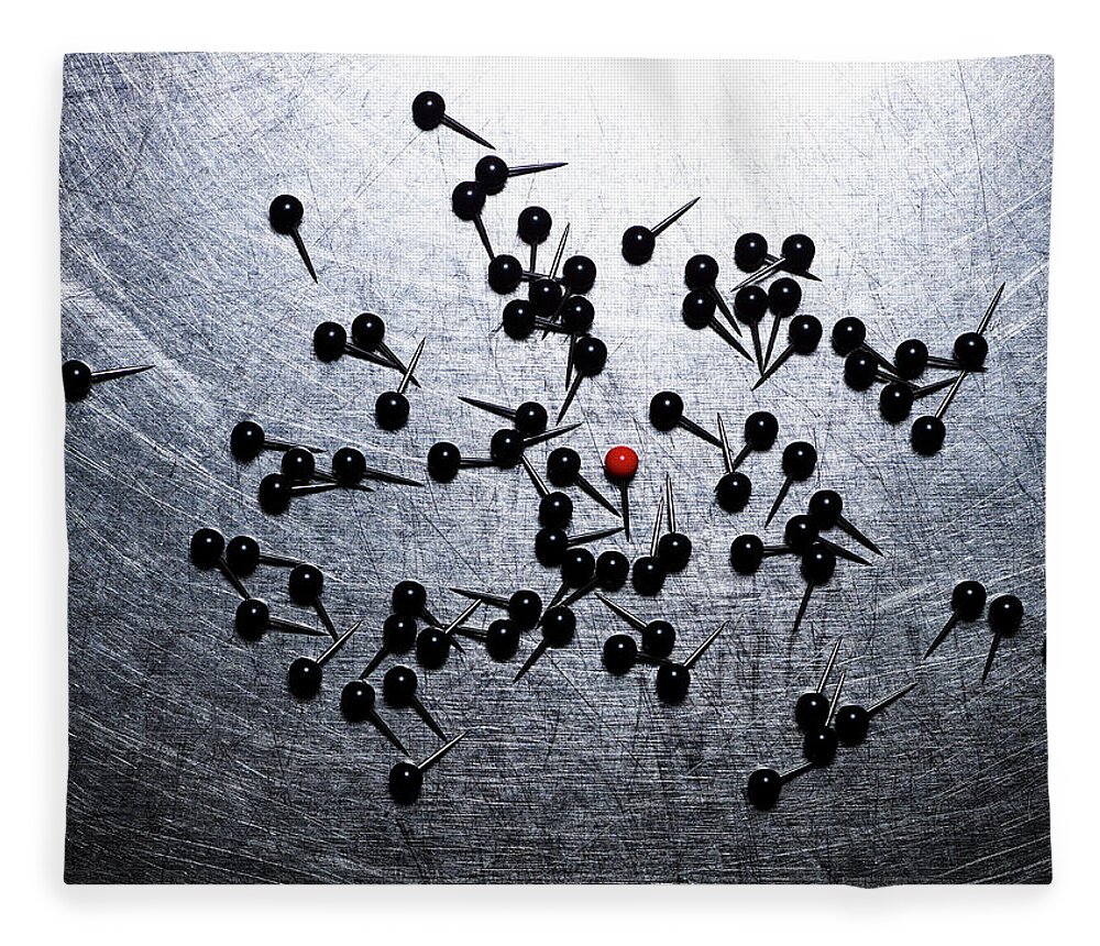 Black Color Fleece Blanket featuring the photograph Black Map Pins With One Red Pin by Ballyscanlon