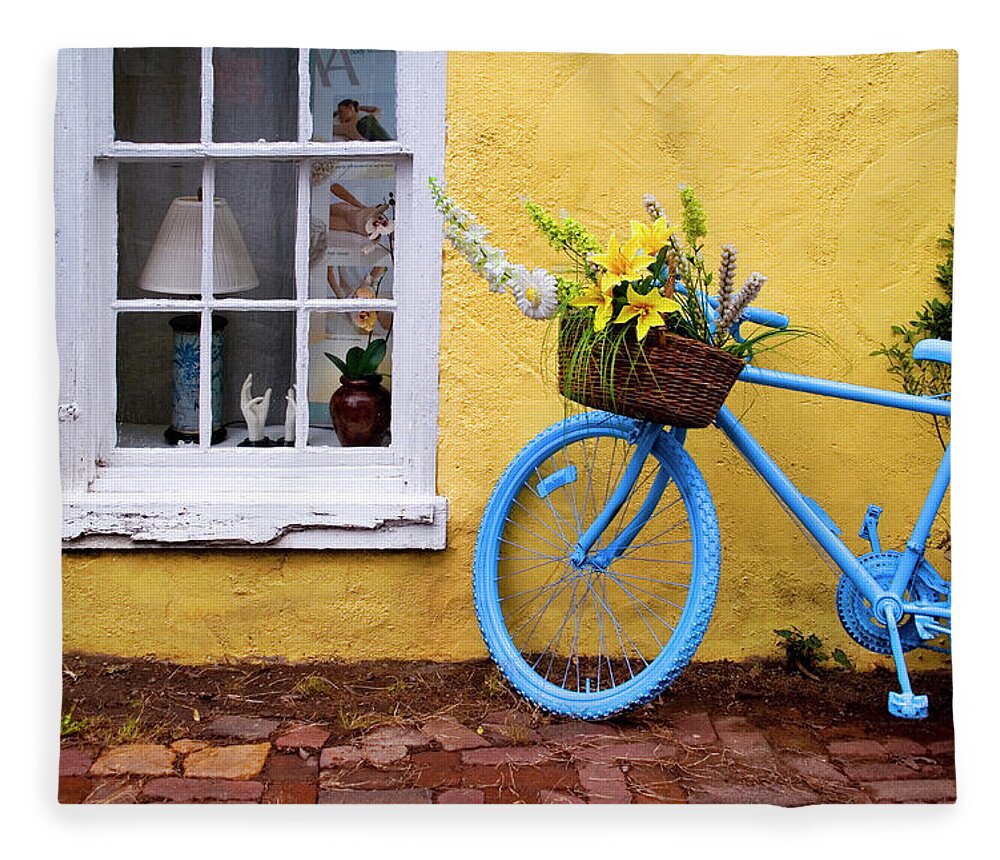 Outdoors Fleece Blanket featuring the photograph Blue Bike Against Yellow Wall by Kevin B. Moore