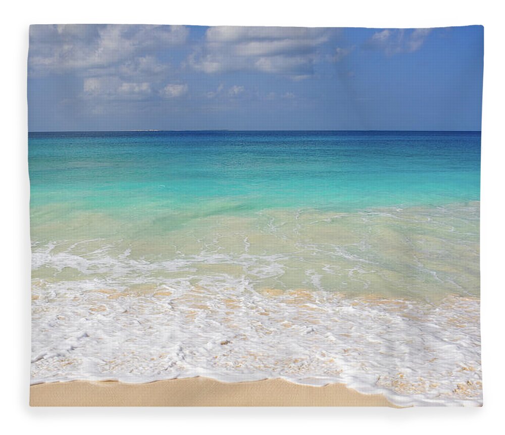 Tranquility Fleece Blanket featuring the photograph Blue Ocean And White Water Crashing On by Alberto Guglielmi