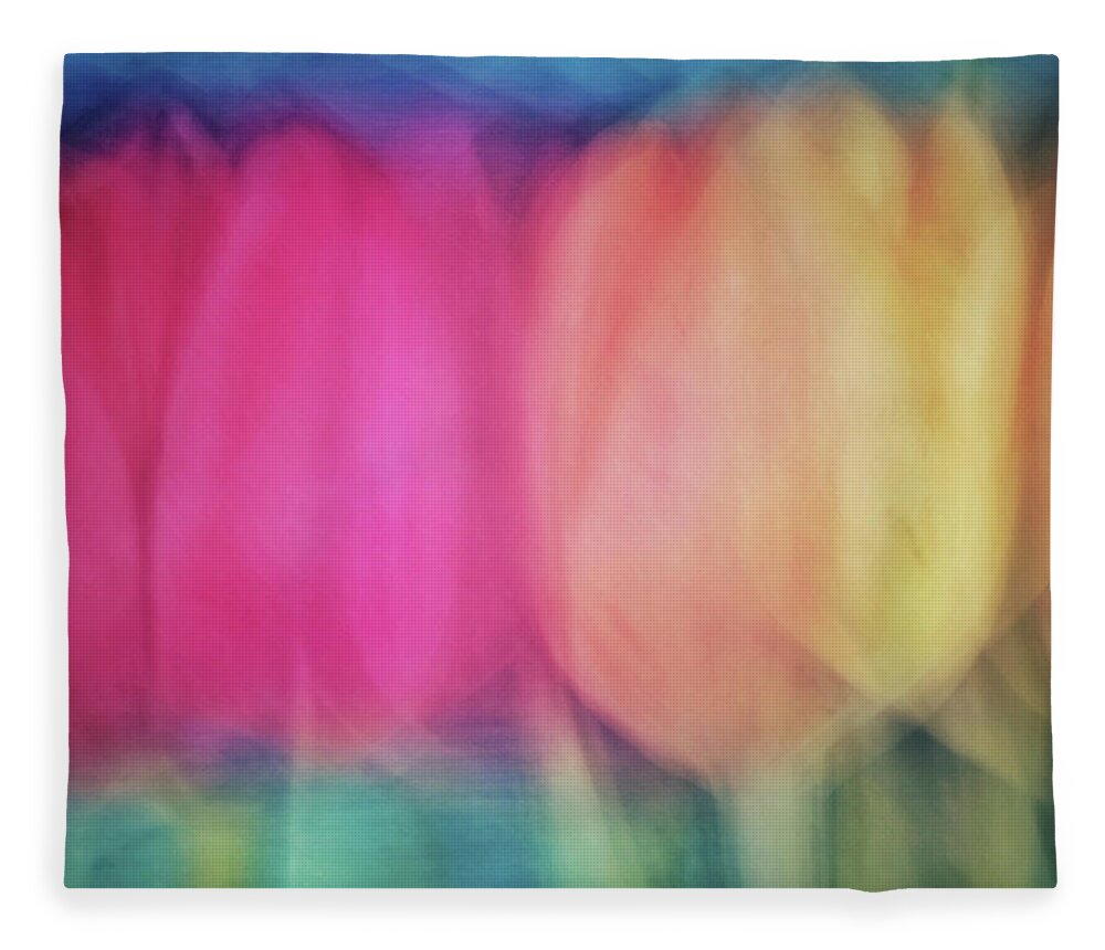 Abstract Fleece Blanket featuring the photograph Blurred tulip flower like abstract background with pinks, yellows, greens and peach colors by Teri Virbickis