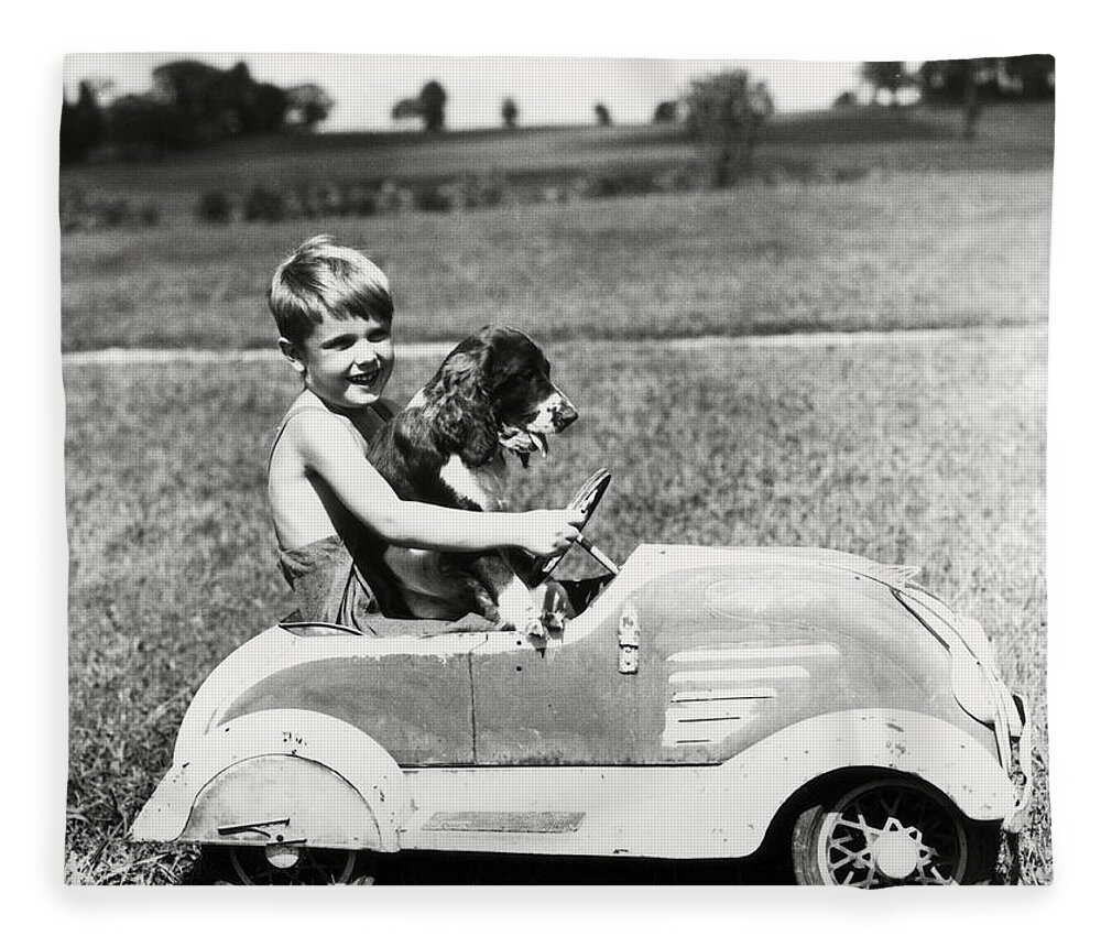 Aerodynamic Fleece Blanket featuring the photograph Boy Driving Toy Car, With Springer by H. Armstrong Roberts