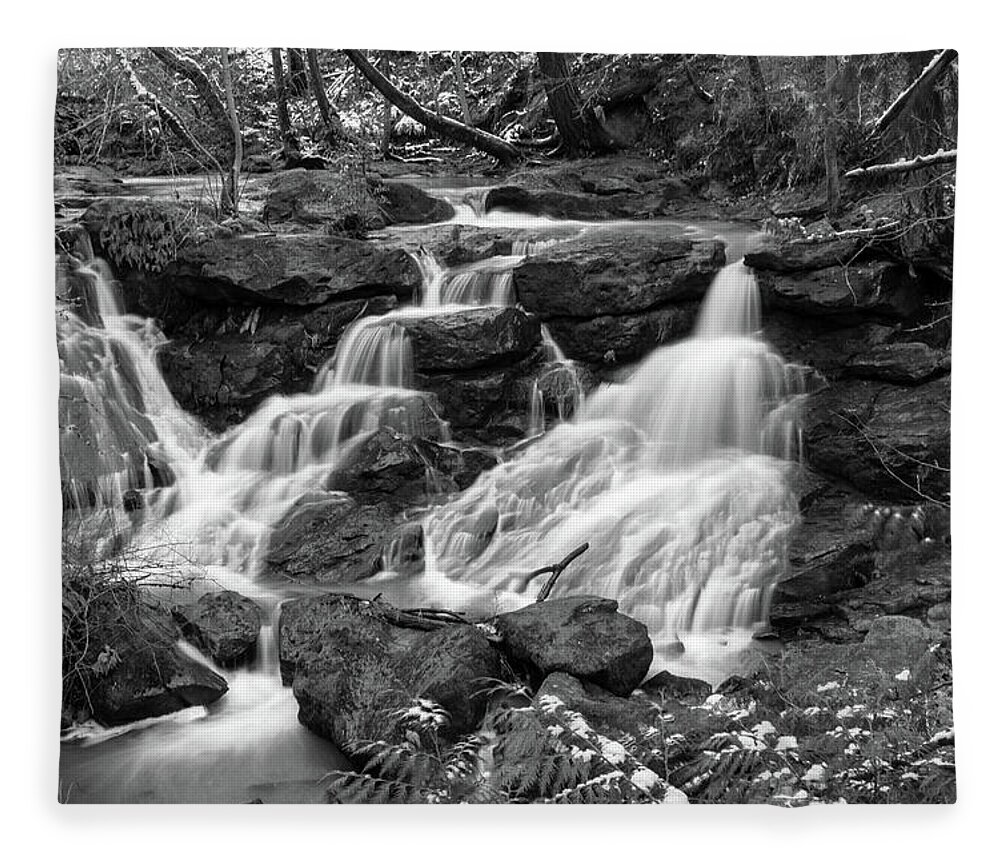 Waterfall Fleece Blanket featuring the photograph Cedar Mills Falls in monochrome by Aashish Vaidya