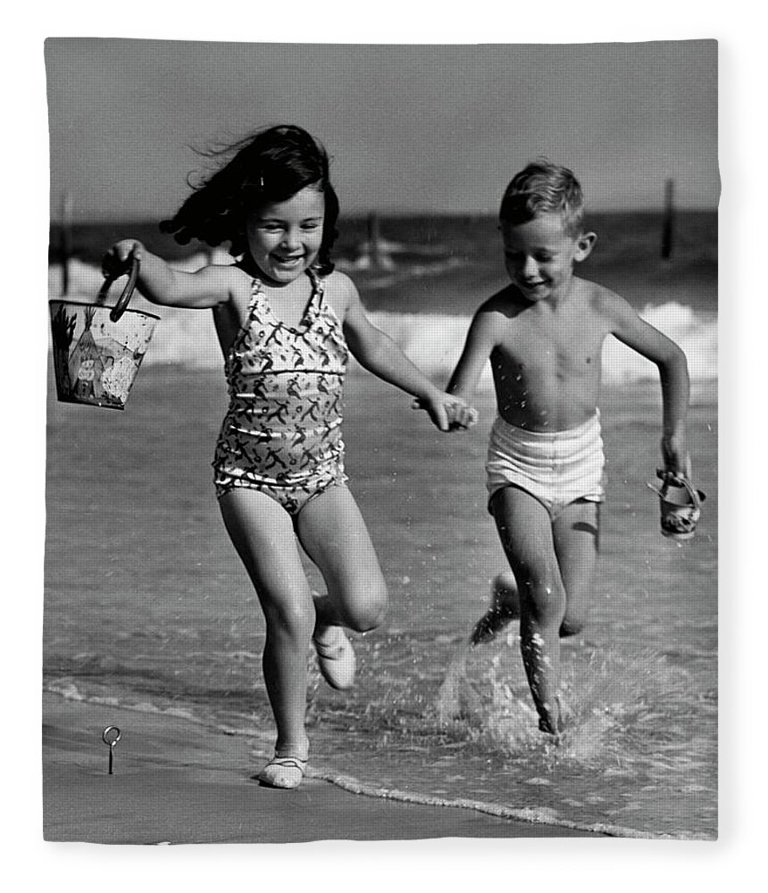 Child Fleece Blanket featuring the photograph Children Playing At Seashore by George Marks