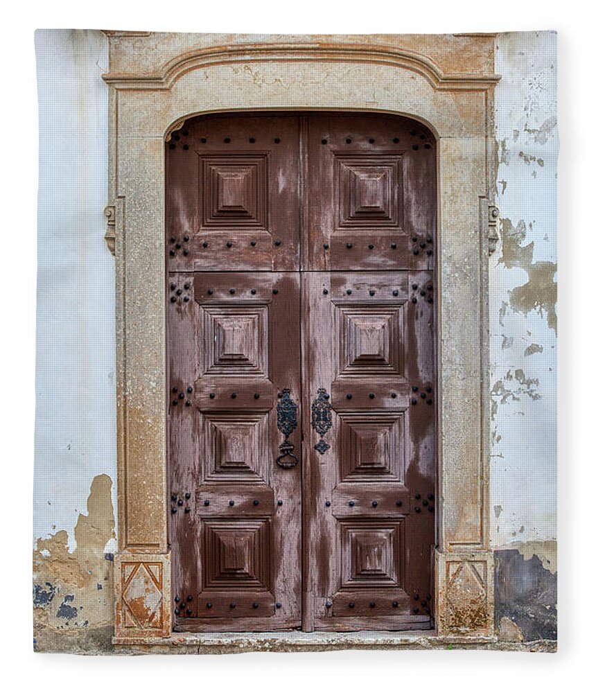 Castle Fleece Blanket featuring the photograph Church Door of Obidos by David Letts