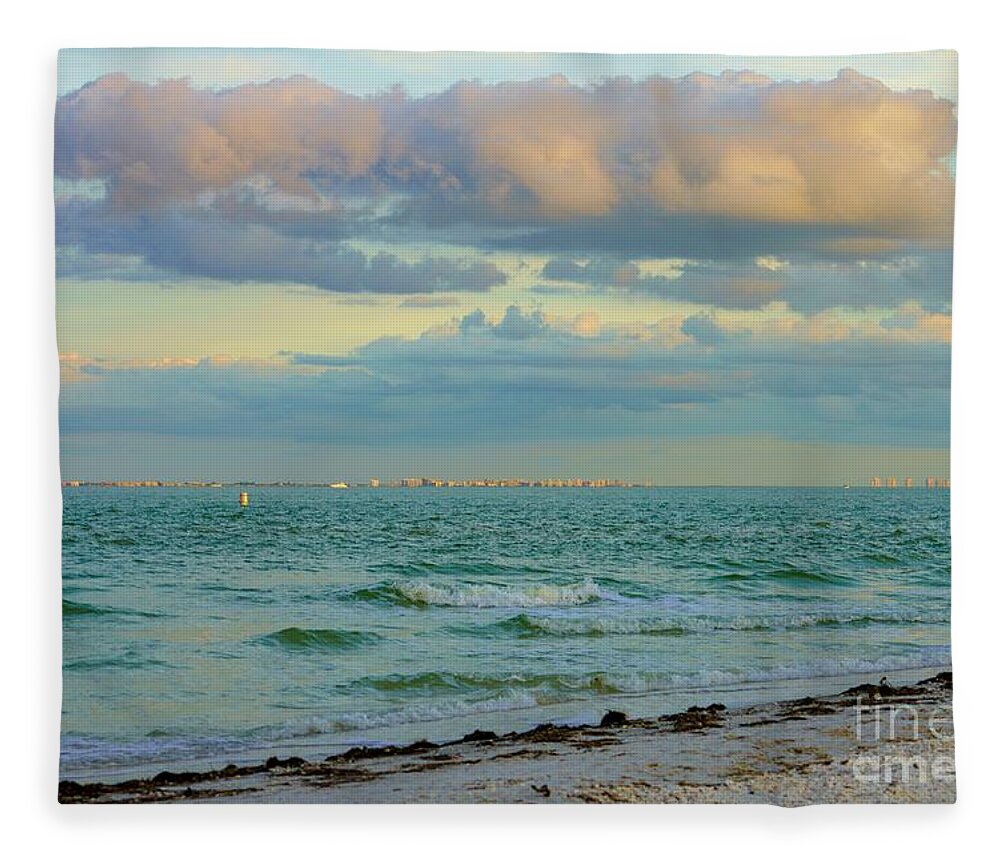 Sea Fleece Blanket featuring the photograph Clouds over Sanibel Beach by Susan Rydberg
