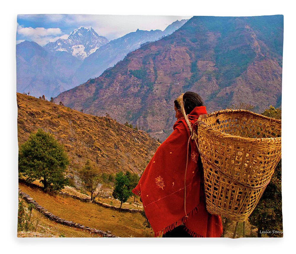 Trek Fleece Blanket featuring the photograph Daily life for a working woman in the Himalayas of Nepal by Leslie Struxness