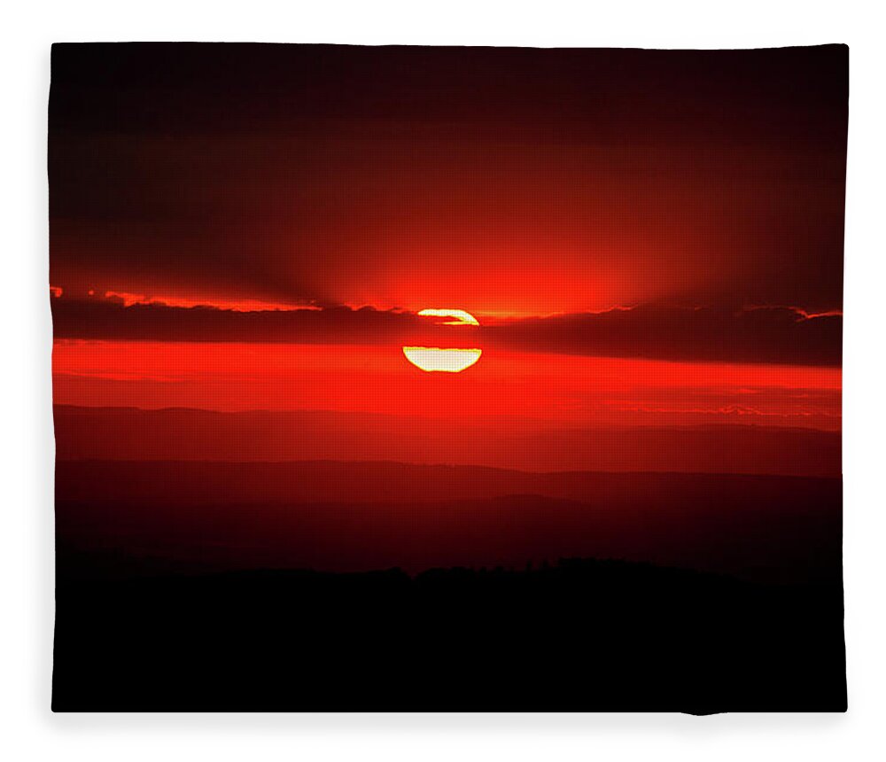 Sunset Fleece Blanket featuring the photograph Dark red sun in Vogelsberg by Sun Travels