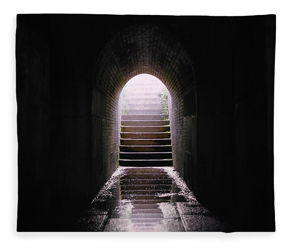 Tranquility Fleece Blanket featuring the photograph Dark Watery Tunnel by Laura Findlay