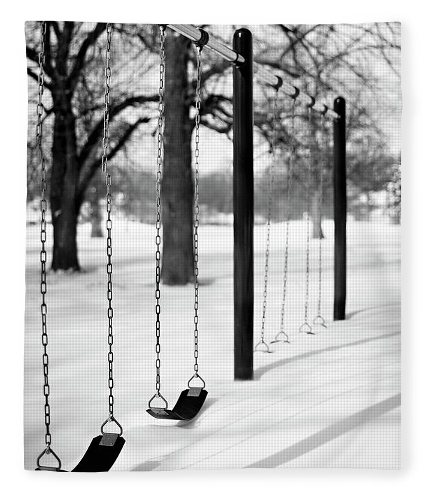 Tranquility Fleece Blanket featuring the photograph Deep Snow & Empty Swings After The by Trina Dopp Photography