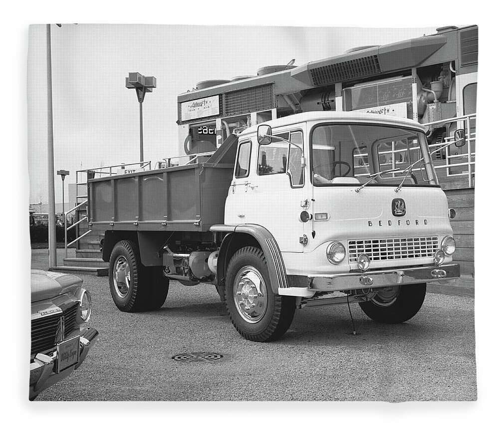 Freight Transportation Fleece Blanket featuring the photograph Dump Truck On Parking Lot, B&w by George Marks