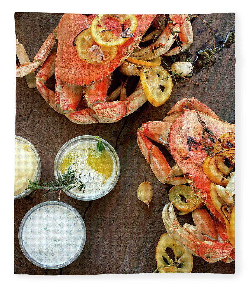 Roast Dinner Fleece Blanket featuring the photograph Fire Roasted Dungeness Crabs On Wooden by Lisa Romerein
