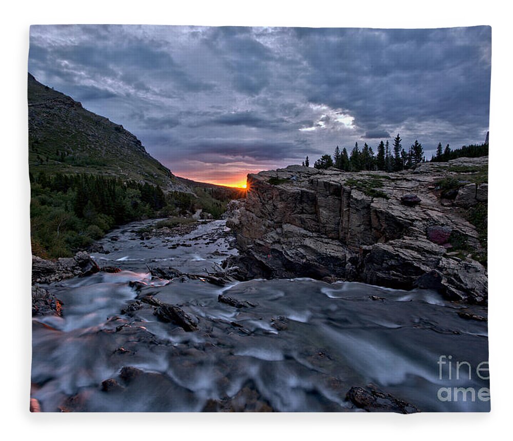 Swiftcurrent Falls Fleece Blanket featuring the photograph First Sunlight Over Swiftcurrent Falls by Adam Jewell