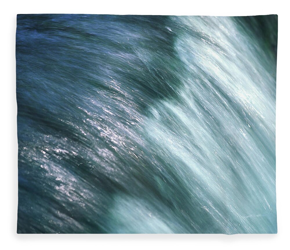 Blurred Motion Fleece Blanket featuring the photograph Flowing Water by Ooyoo