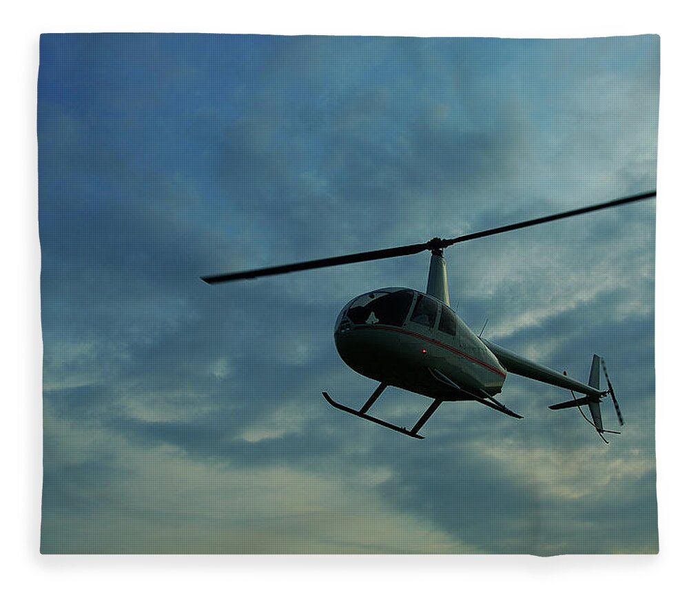 Mid-air Fleece Blanket featuring the photograph Flying Helicopter by Copyright Bong Manayon