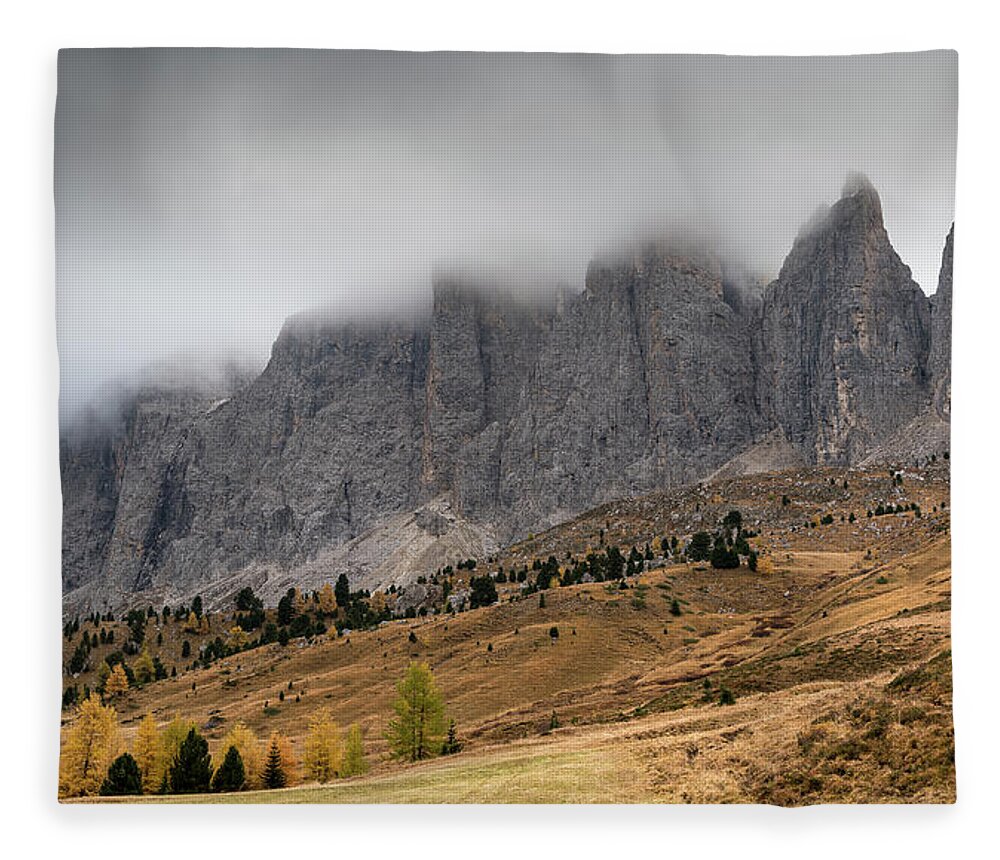 Mood Fleece Blanket featuring the photograph Foggy mountain landscape of the picturesque Dolomites mountains by Michalakis Ppalis