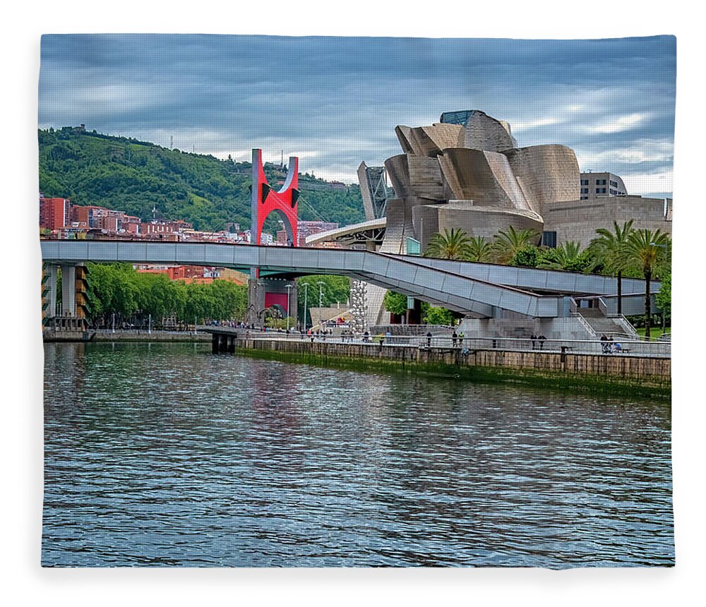Cudillero Spain Fleece Blanket featuring the photograph Guggenheim Museum by Tom Singleton