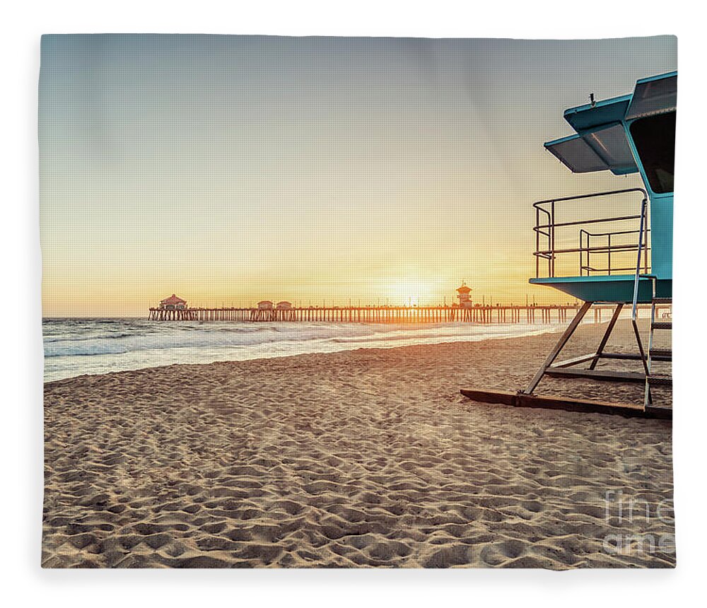 America Fleece Blanket featuring the photograph Huntington Beach Lifeguard Tower 3 and Pier Sunset Photo by Paul Velgos