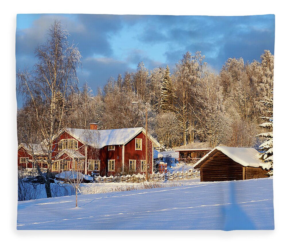 Snow Fleece Blanket featuring the photograph Idyllic Red Swedish House Against A by Jonaseriksson