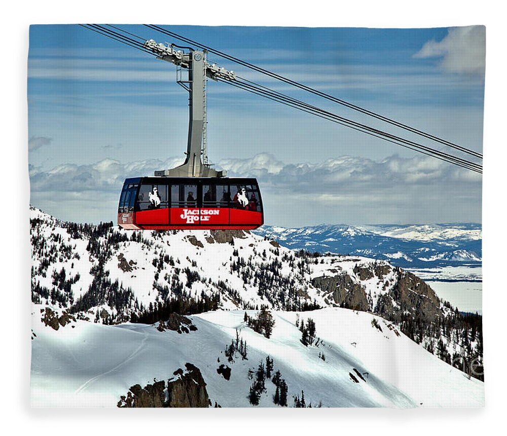Jackson Hole Tram Fleece Blanket featuring the photograph Jackson Hole Aerial Tram Over The Snow Caps by Adam Jewell
