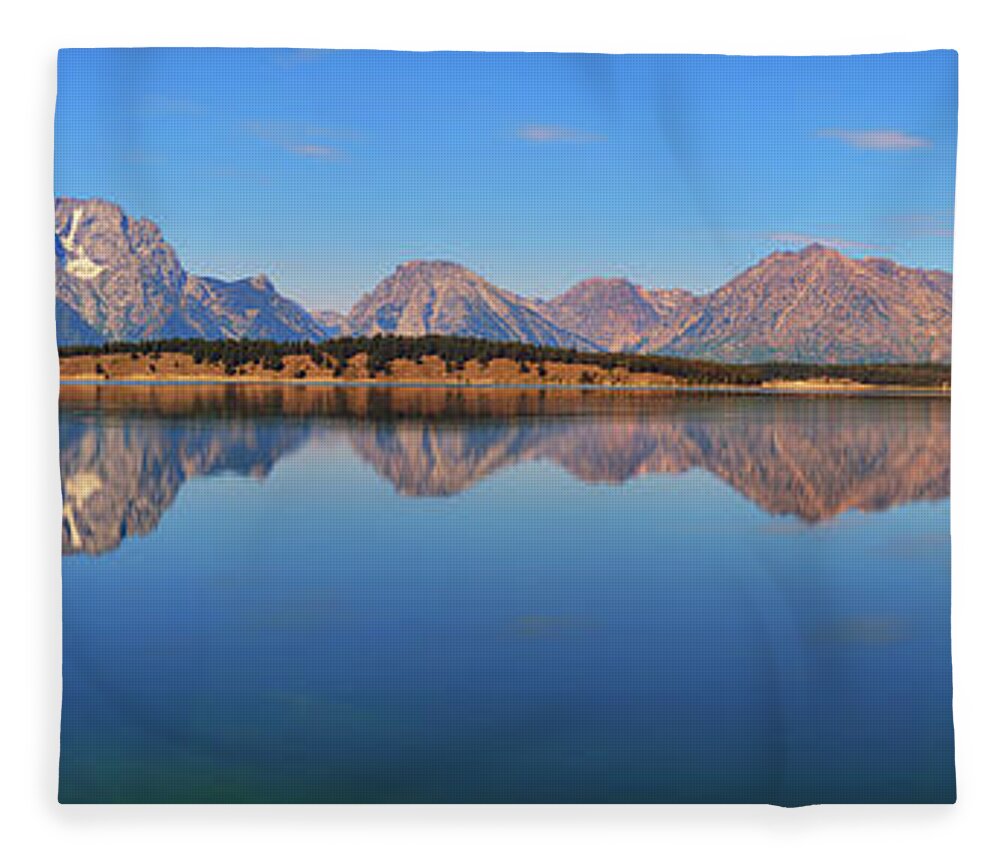Jackson Lake Fleece Blanket featuring the photograph Jackson Lake Panoramic Morning Reflections by Greg Norrell