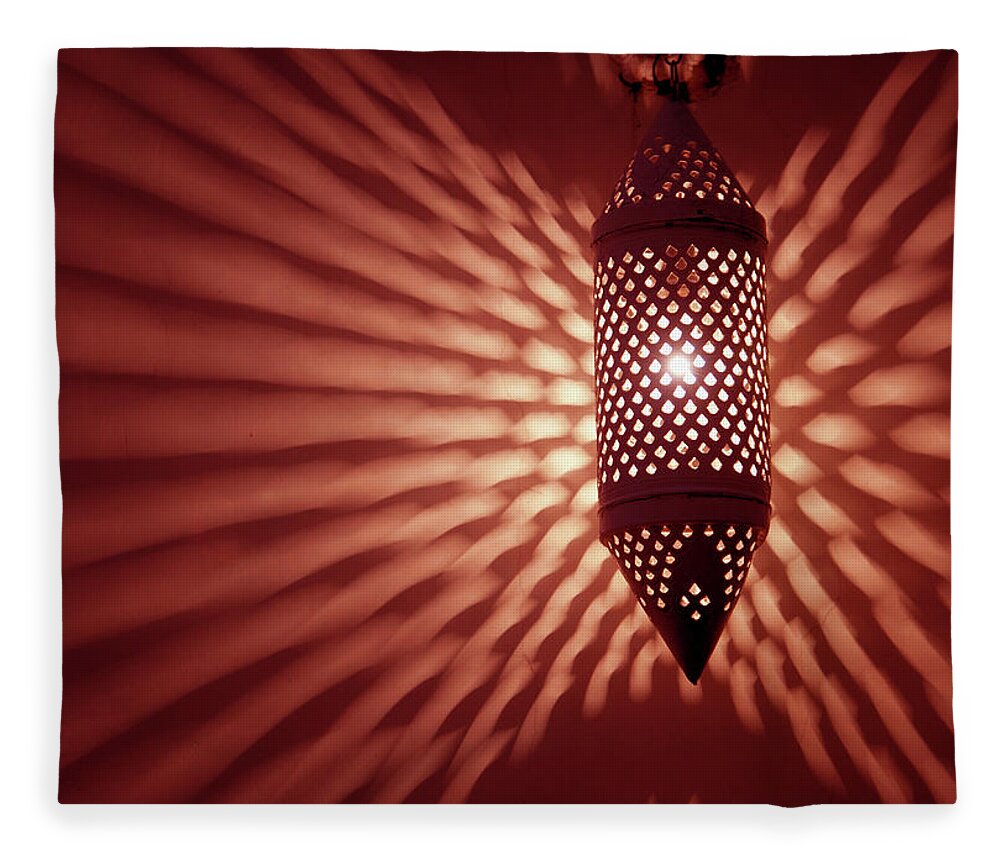Jaipur Fleece Blanket featuring the photograph Lantern Casting Patterns On A Wall by Shanna Baker
