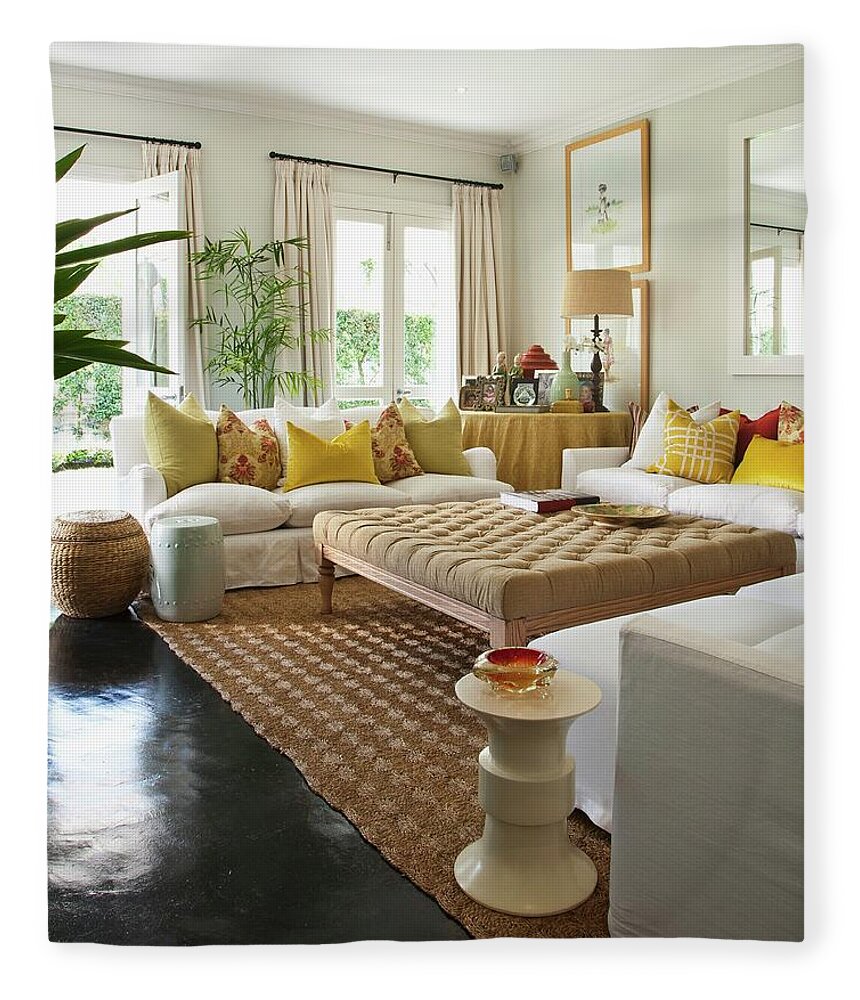 https://render.fineartamerica.com/images/rendered/default/flat/blanket/images/artworkimages/medium/2/large-ottoman-surrounded-by-white-sofas-with-many-yellow-scatter-cushions-in-bright-living-room-with-dark-glossy-floor-great-stock.jpg?&targetx=0&targety=-37&imagewidth=800&imageheight=1026&modelwidth=800&modelheight=952&backgroundcolor=D4D5C9&orientation=0&producttype=blanket-coral-50-60