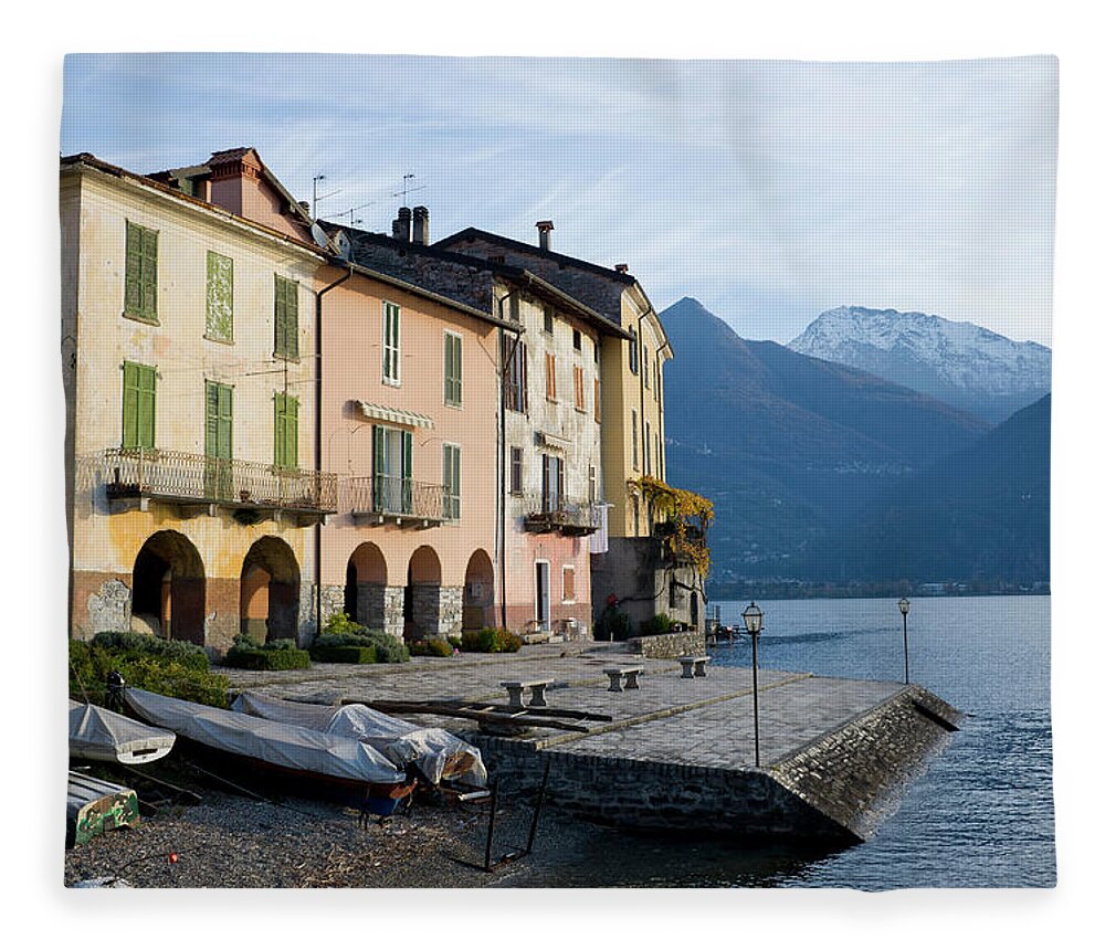 Water's Edge Fleece Blanket featuring the photograph Little Harbour In Lake Como At Dawn by Cirano83