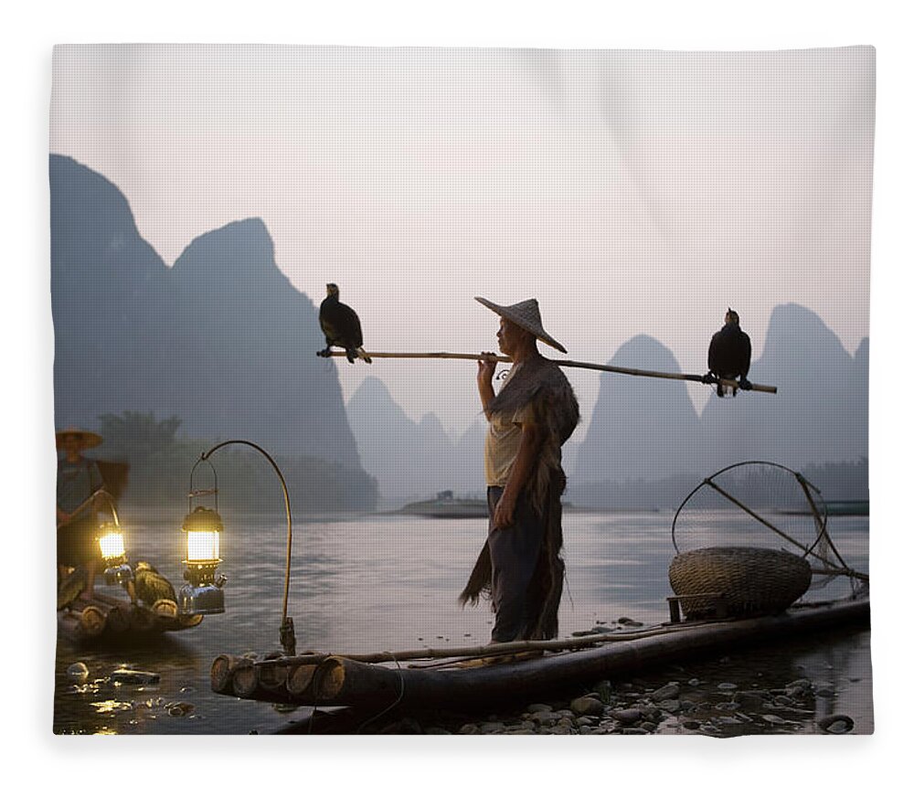 Only Mature Men Fleece Blanket featuring the photograph Mature Fisherman With Cormorans, Dusk by Buena Vista Images