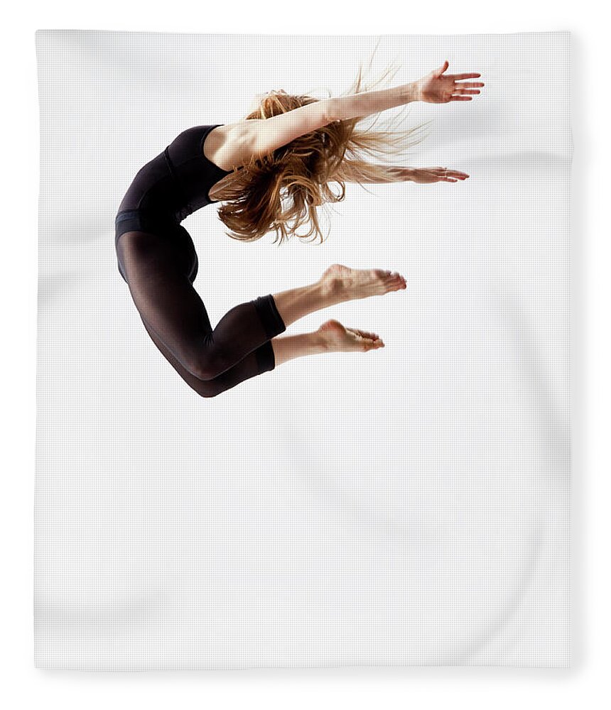 Human Arm Fleece Blanket featuring the photograph Modern Dancer Jumping In The Air by Jonya