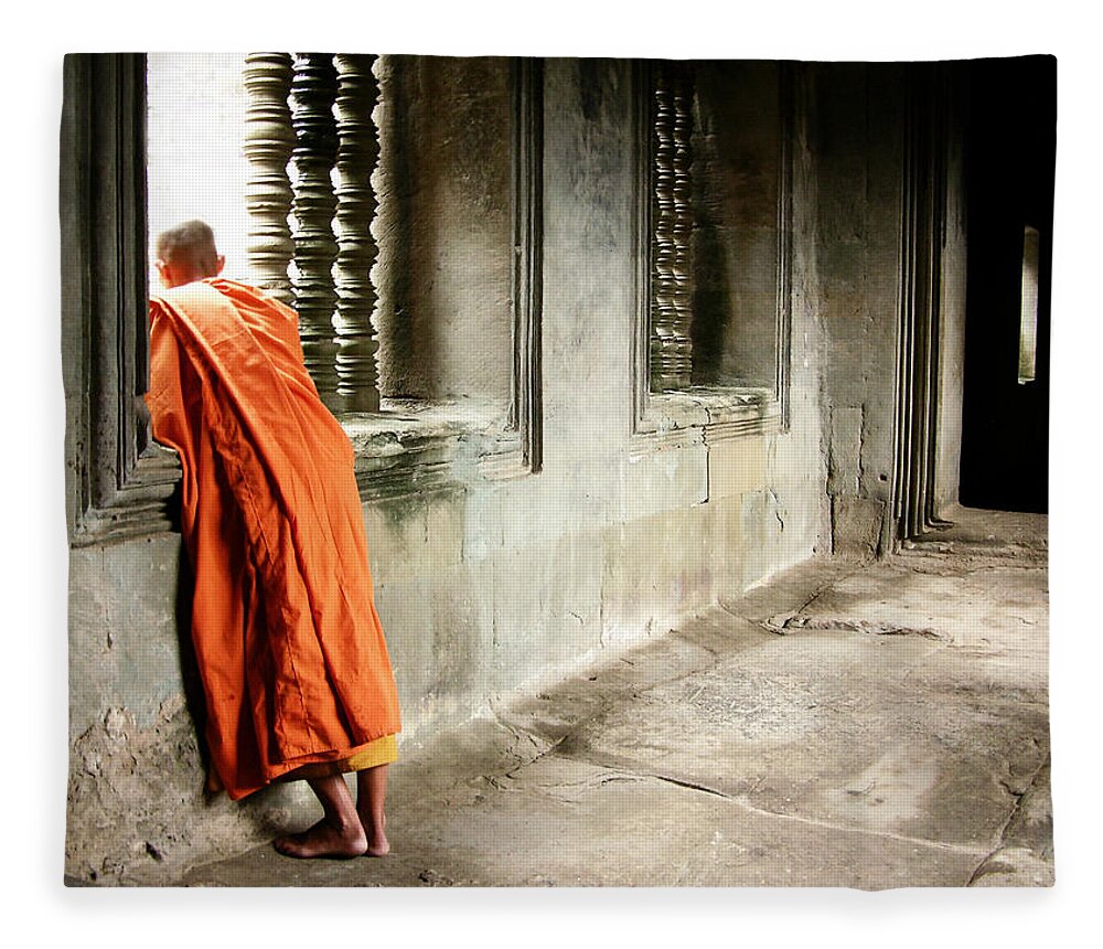 Hinduism Fleece Blanket featuring the photograph Monk In Orange Robe Looking Out Window by Lore