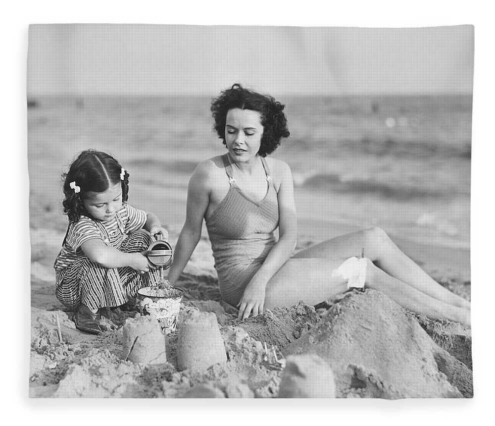 Mid Adult Women Fleece Blanket featuring the photograph Mother With Girl 2-3 Playing In Sand On by George Marks