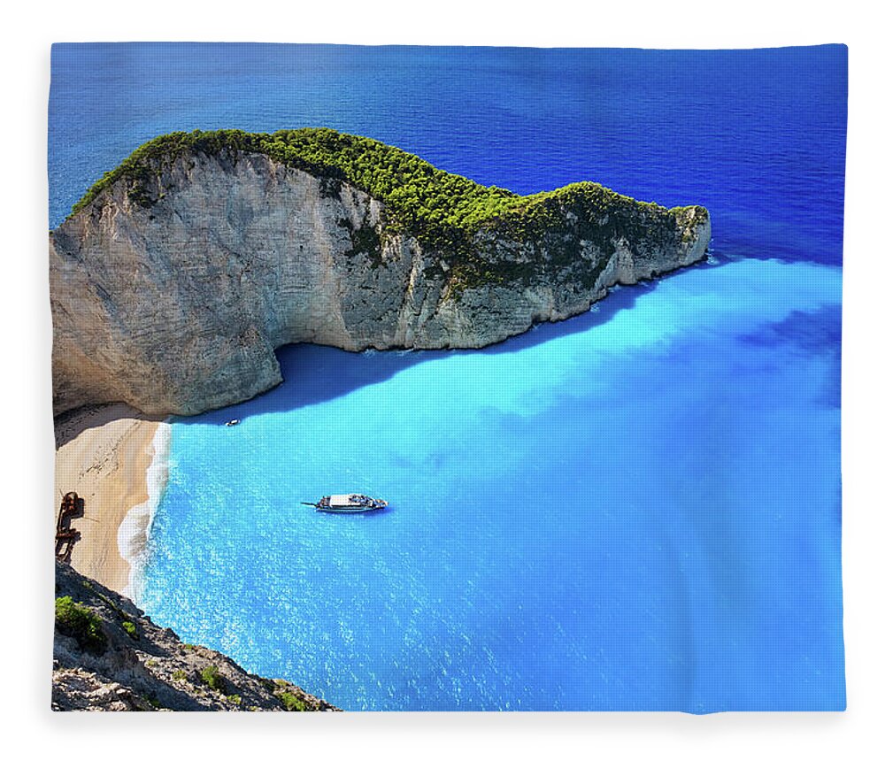 Extreme Terrain Fleece Blanket featuring the photograph Navagio Beach, Zakynthos Island, Greece by Rusm