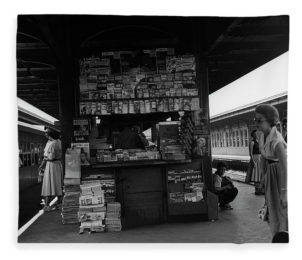 People Fleece Blanket featuring the photograph News Stand Between Train Station by George Marks
