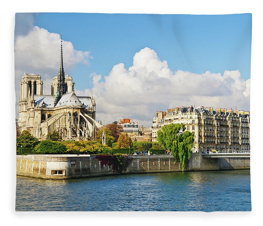 Old Town Fleece Blanket featuring the photograph Notre Dame Cathedral And Isle De La Cite by Tom Bonaventure