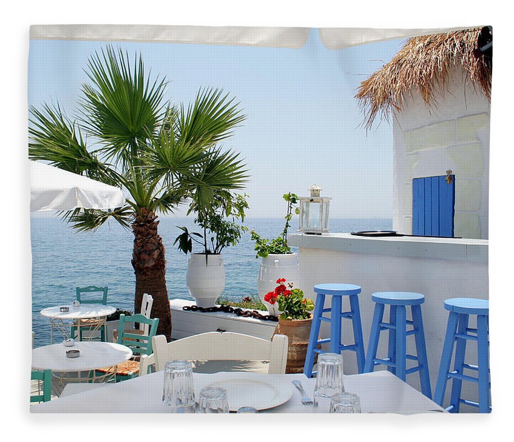Greek Culture Fleece Blanket featuring the photograph Open Air Restaurant By The Sea In by Alanphillips