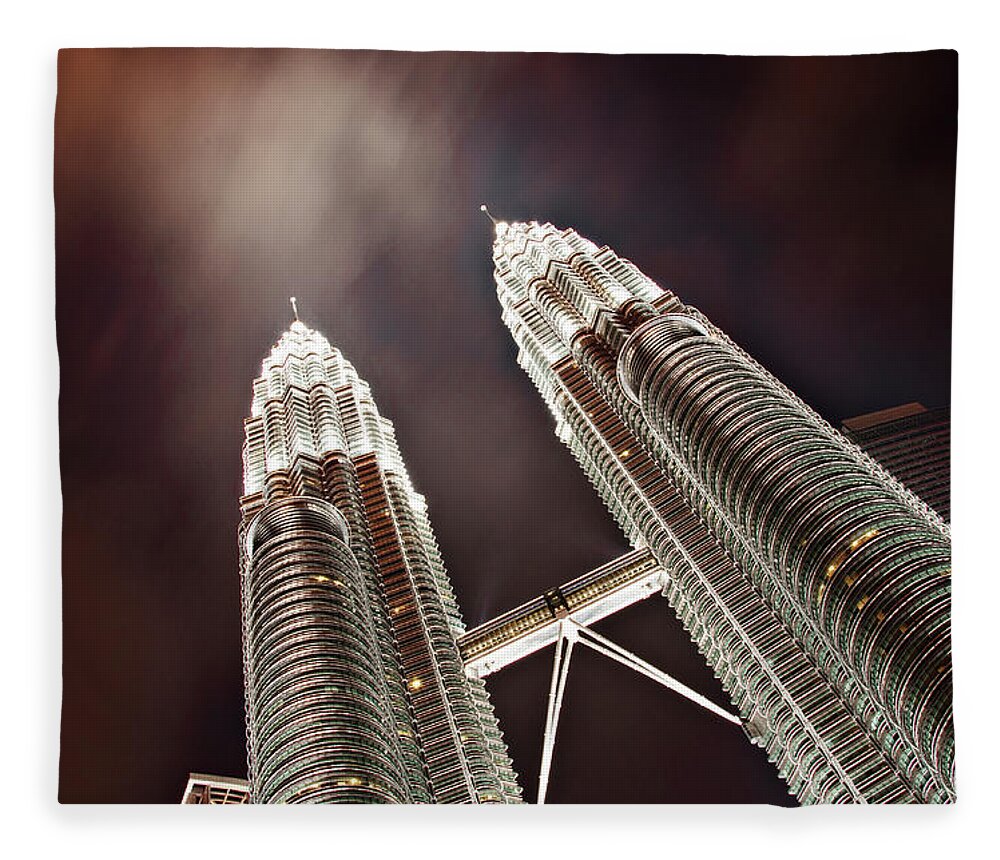 Directly Below Fleece Blanket featuring the photograph Petronas Towers by Smerindo schultzpax