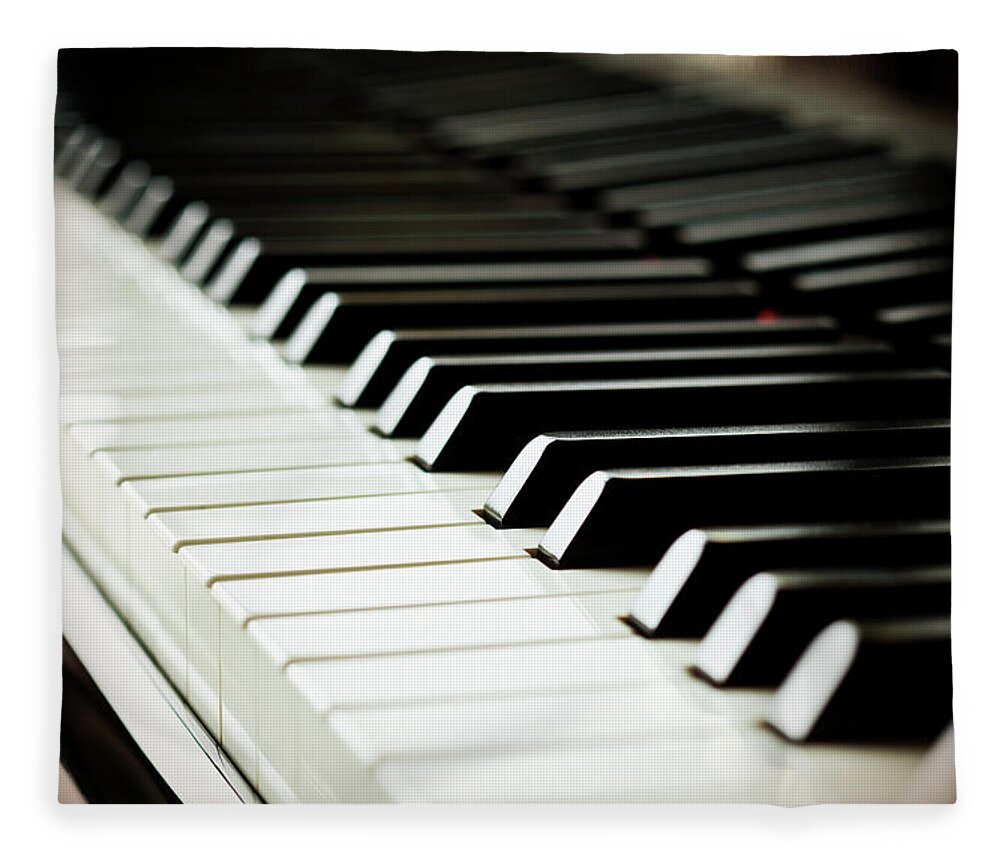 Piano Fleece Blanket featuring the photograph Piano Keys by Mbbirdy